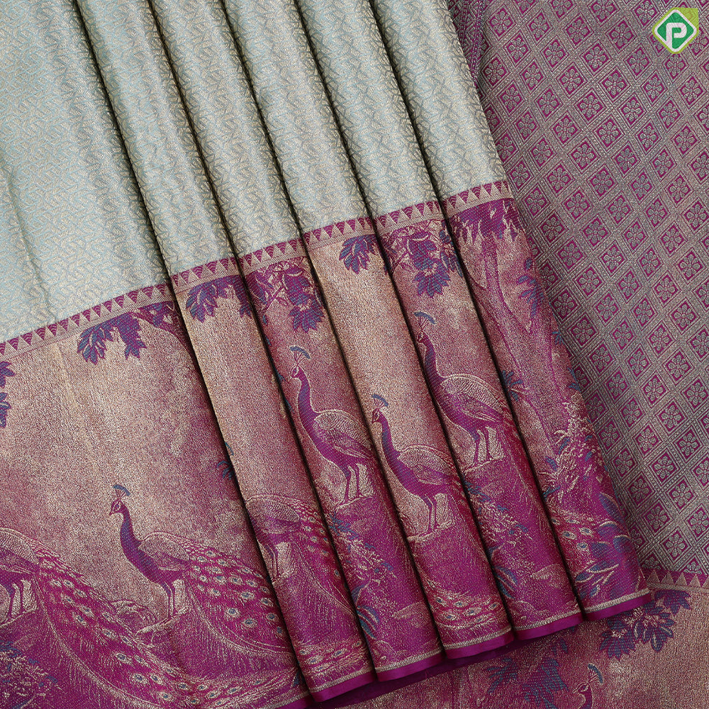 Pista green gold zari zig zag crystal design purple peacock under tree art effect trendy tissue silk saree