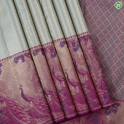 Pista green gold zari zig zag crystal design purple peacock under tree art effect trendy tissue silk saree