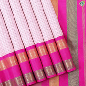 peach with pink silk thread small checkered contrast pink with gold zari rettapet gap border traditional silk saree