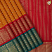 Mustard yellow silver gold zari small butta motifs paaalum pazhamum gold zari border traditional silk saree