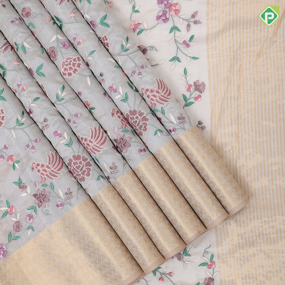 cream base multi color floral embroidered design peach cream gold zari star diamond lines border kora silk saree