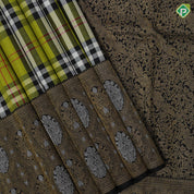 Apple green base multi color mardas checks design black color silver gold zari banaras style border traditional silk saree
