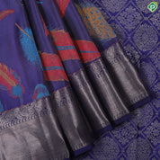 Indigo blue multi color feather design self color silver zari rangoli zig zag border trendy silk saree