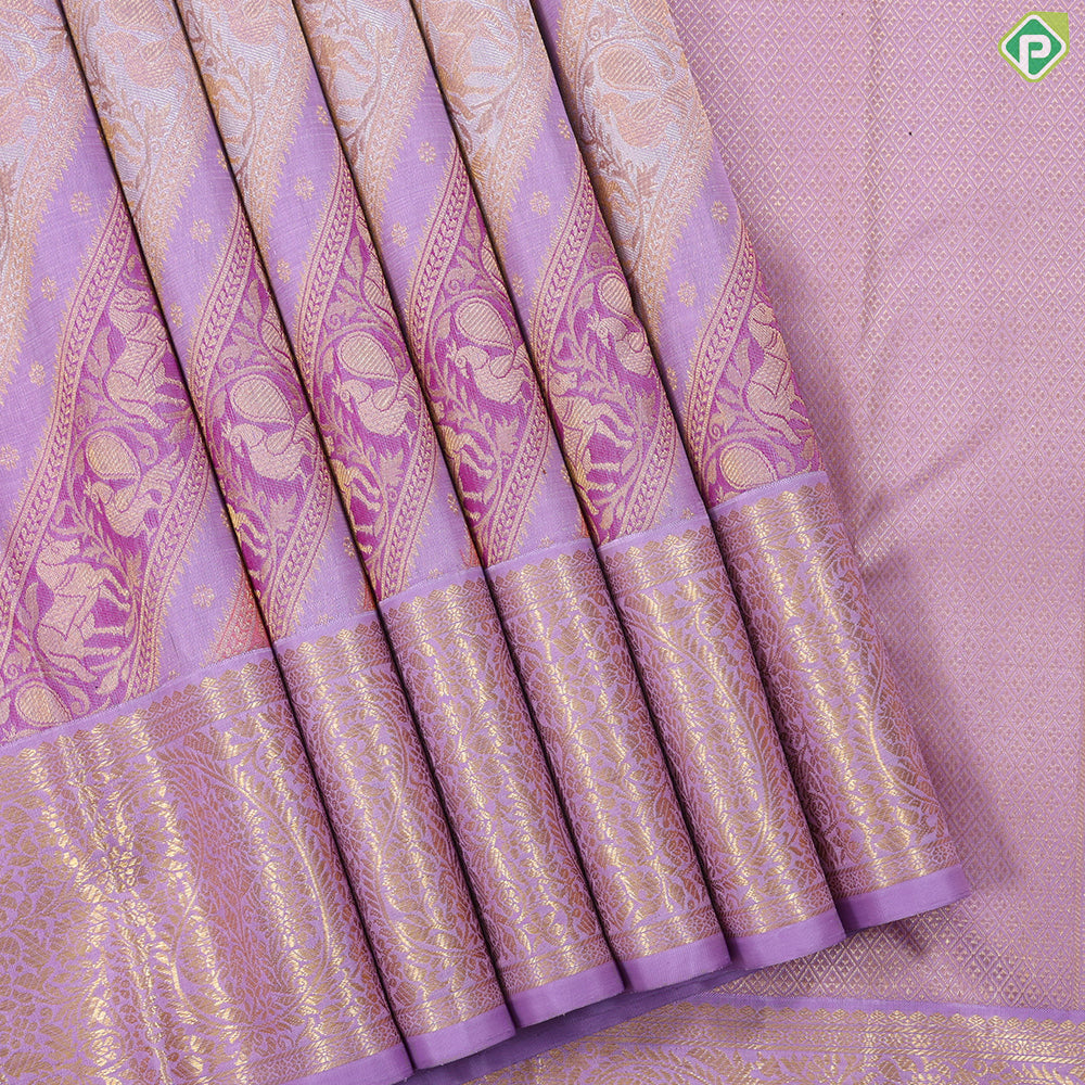 Lavender base multi color silver gold zari butta rangoli lines self mango butta border exclusive bridal silk saree