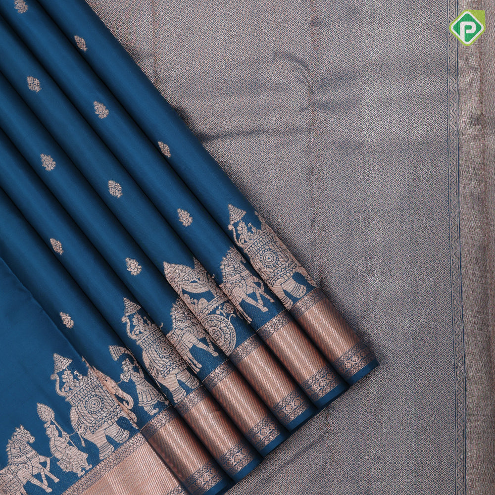 Teal blue copper zari small fancy butta design self copper zari cross lines yaanai ambari border silk saree