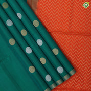 Emarald green silver gold zari round dots self gold zari border contrast orange pallu soft silk saree