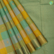 Multi colour Checks gaja Yaali and chakkaram butta self gold zari zig zag border traditional silk saree