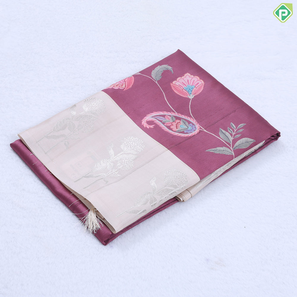Violet with multi color floral creeper design contrast cream with silver zari flower border semi tusser saree