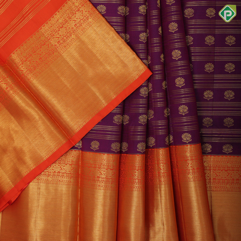 Purple gold zari lines and flower butta lines orange gold zari border pattu paavadai lehanka