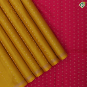 Mustard yellow gold zari dots lines self gold zari line border contrast pink gold zari dot pallu soft silk saree