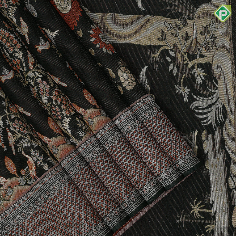 Dark emerald green molten golden zari birds grand tree florals diamond pattern borders landscape inspired signature silk saree