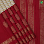 Cream with beige checks body design maroon gold zari butta high three part border concept vintage silk saree