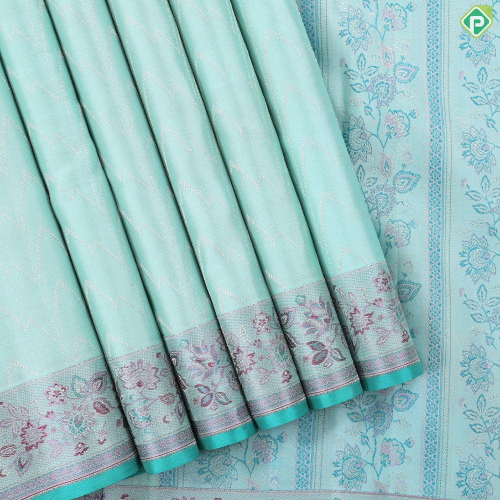 Suffire green silver zari zig zag waves design self multi color pythonic border grand bridal silk saree