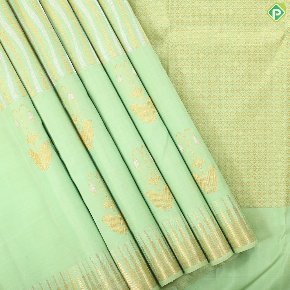 Pista green silver gold zari waves stripes design self gold zari flower tower fancy border trendy silk saree