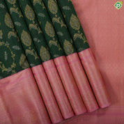 Forest green gold zari grand floral design contrast pale pink gold zari border grand bridal silk saree