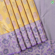 Cyber yellow zari thread floral butta design dark lavender fancy flowers meena work tissue border trendy silk saree