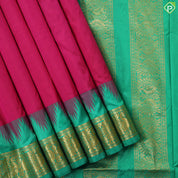 Reddish pink plain weaved design contrast green gold zari double peacock butta temple border madisar 11 yards silk saree