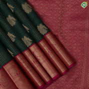 Bottle green gold zari checks flower motif design dark pink peacock elephant border design traditional silk saree