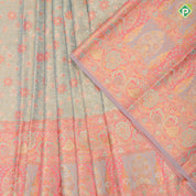 Pista green tissue grand floral design baby pink multi color meena work border pattu paavadai lehanka