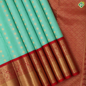 Pista green gold zari thousand butta design rani red gold zari floral border traditional silk saree