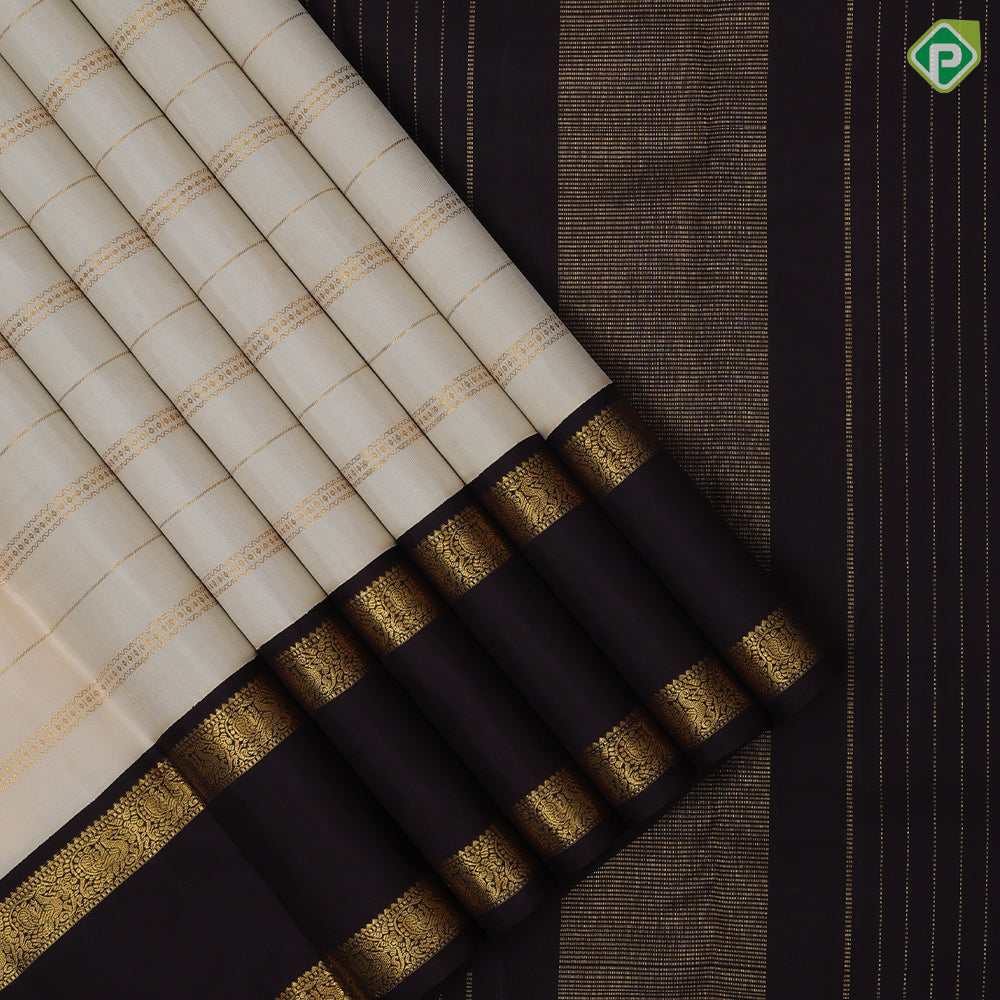 Milk white gold zari velthari design coffee brown peacock floral border design traditional silk saree