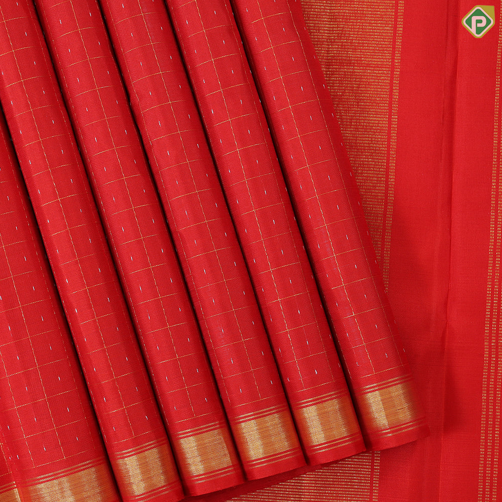 Brick red gold zari mid dotted Checkered design and self gold zari edge border traditional silk saree