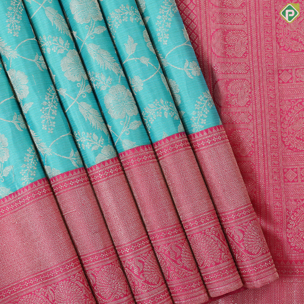 Cool green silver gold zari grand floral design contrast pink border grand bridal silk saree