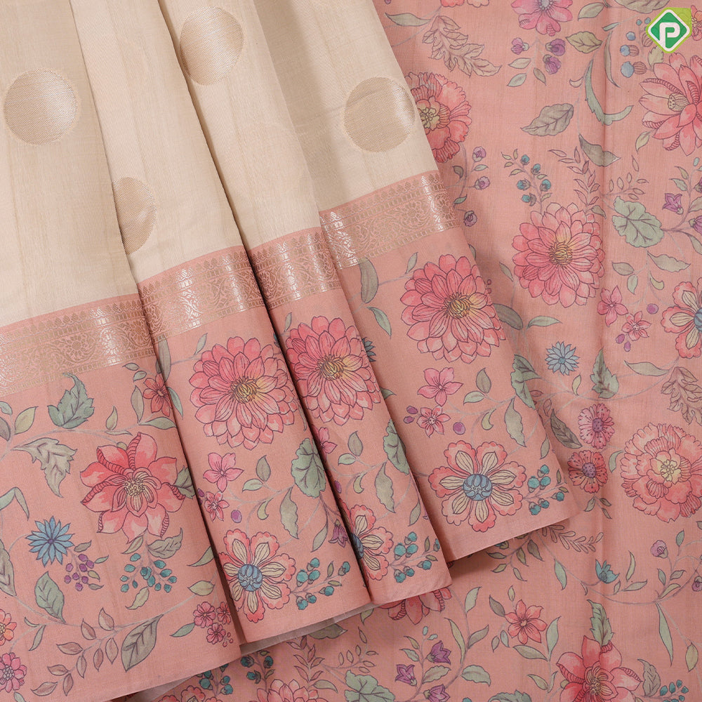 cream with gold zari round butta design baby pink multi colour floral border semi tusser saree