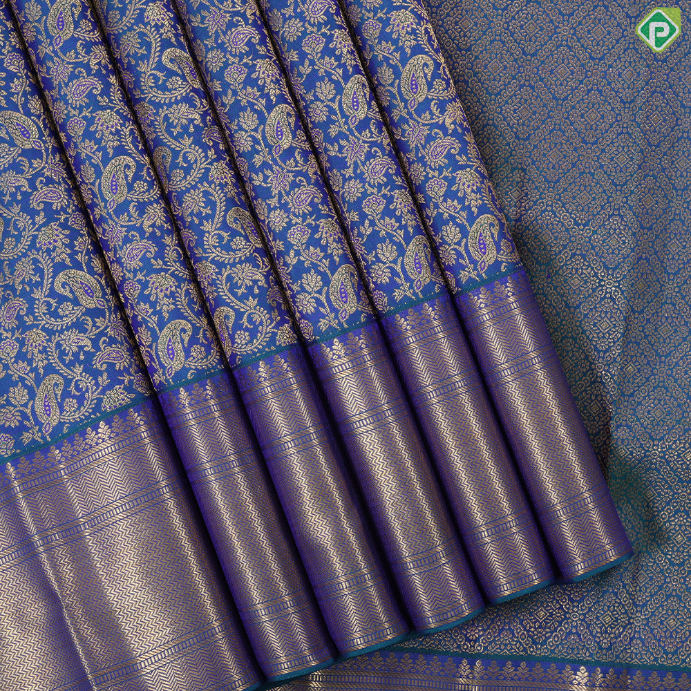 Peacock green gold zari grand mango creeper design peacock blue gold zari zig zag border grand bridal silk saree