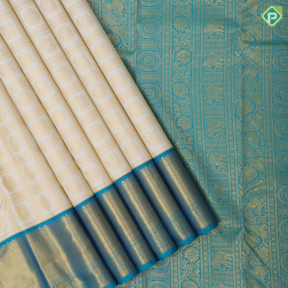 White gold zari annam chakkaram butta checks design peacock green gold zari zig zag stripes border bridal silk saree