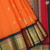 Dark orange gold zari fancy flower butta green red gold zari big diamond design one side border silk saree
