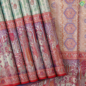 Pista green silver gold zari grand floral meena work design contrast pythonic border grand bridal silk saree