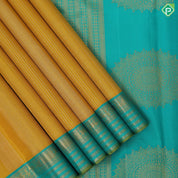Golden mustard silver gold zari lines sapphire green gold zari lines and butta border vintage silk saree