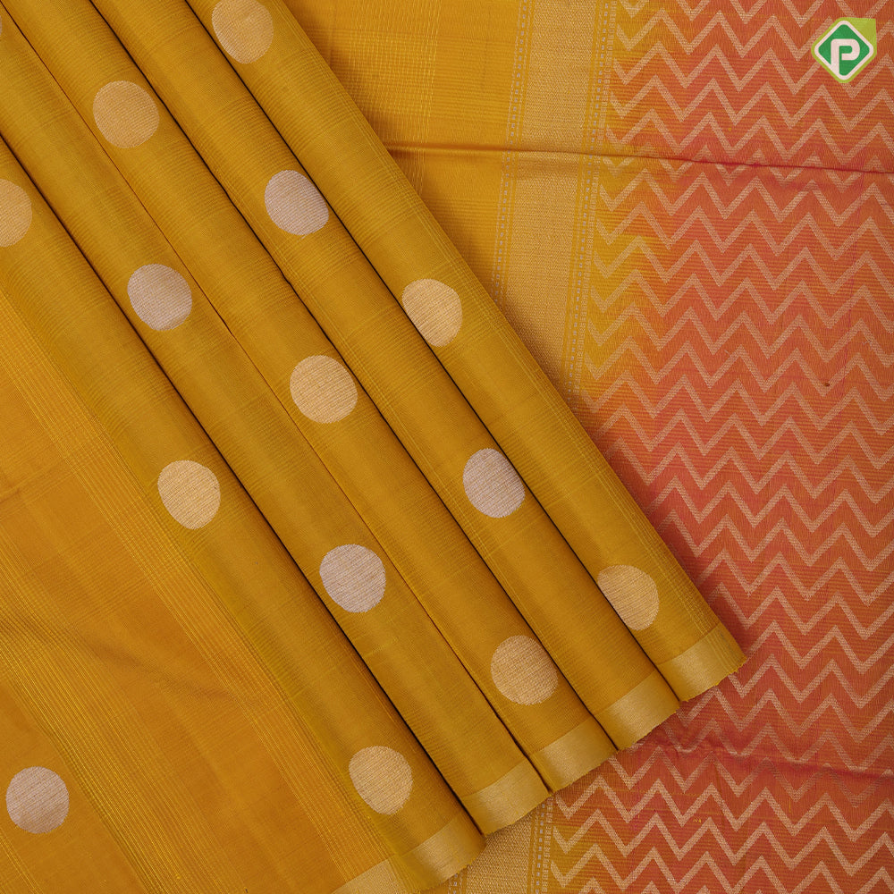 Emarald green silver gold zari round dots self gold zari border contrast orange pallu soft silk saree