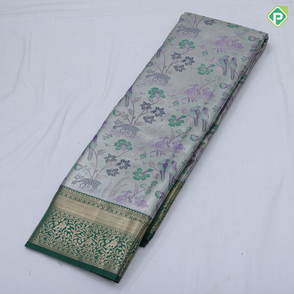 Pewter pink base multi color wild effect design dark green gold zari floral birds design border tissue art silk saree