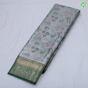 Pewter pink base multi color wild effect design dark green gold zari floral birds design border tissue art silk saree