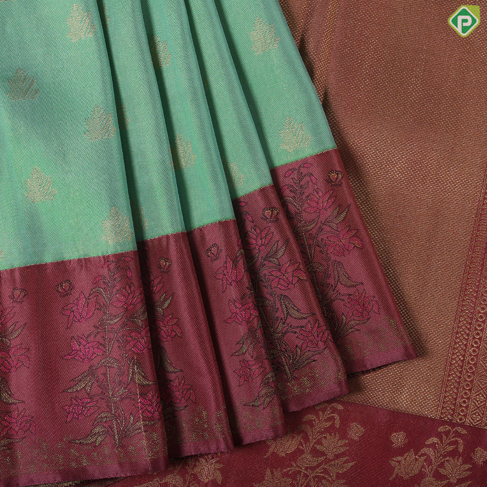 Apple green gold zari butta design Onion Pink meena work flower bunch border trendy silk saree