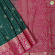 pine green gold zari kattam and elephant butta rani pink gold zari floral design art silk saree
