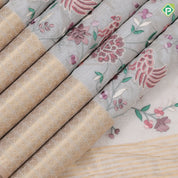 cream base multi color floral embroidered design peach cream gold zari star diamond lines border kora silk saree