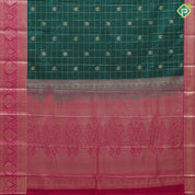 pine green gold zari kattam and elephant butta rani pink gold zari floral design art silk saree