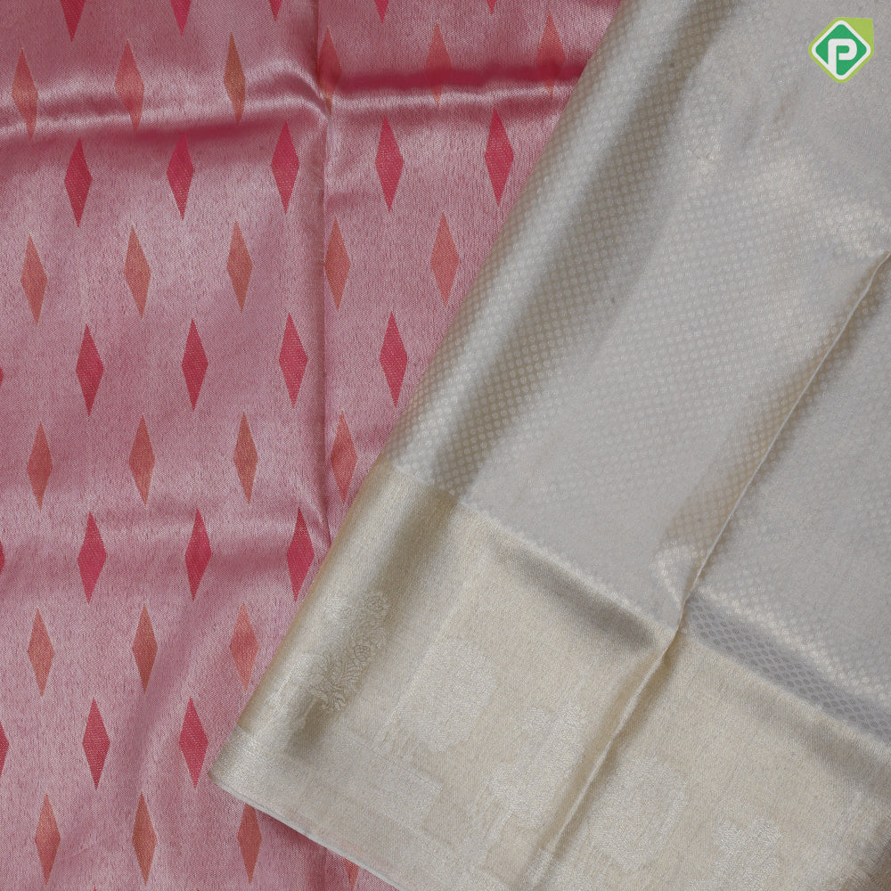 Powder pink dual tone zari and tread diamond butta goldish grey self fancy design border grand tissue silk saree