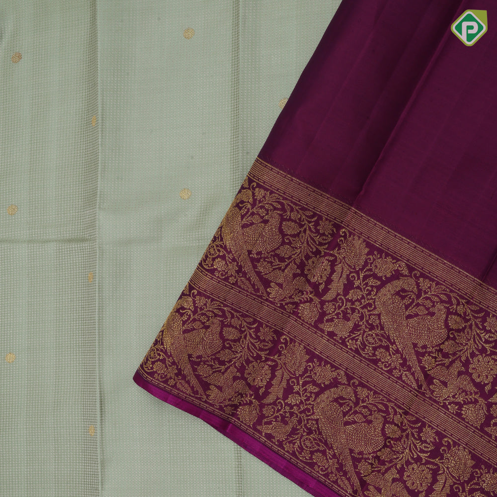 Pista green self designed stripes gold zari chakkaram butta contrast purple gold zari double peacock banaras style border fusion silk saree