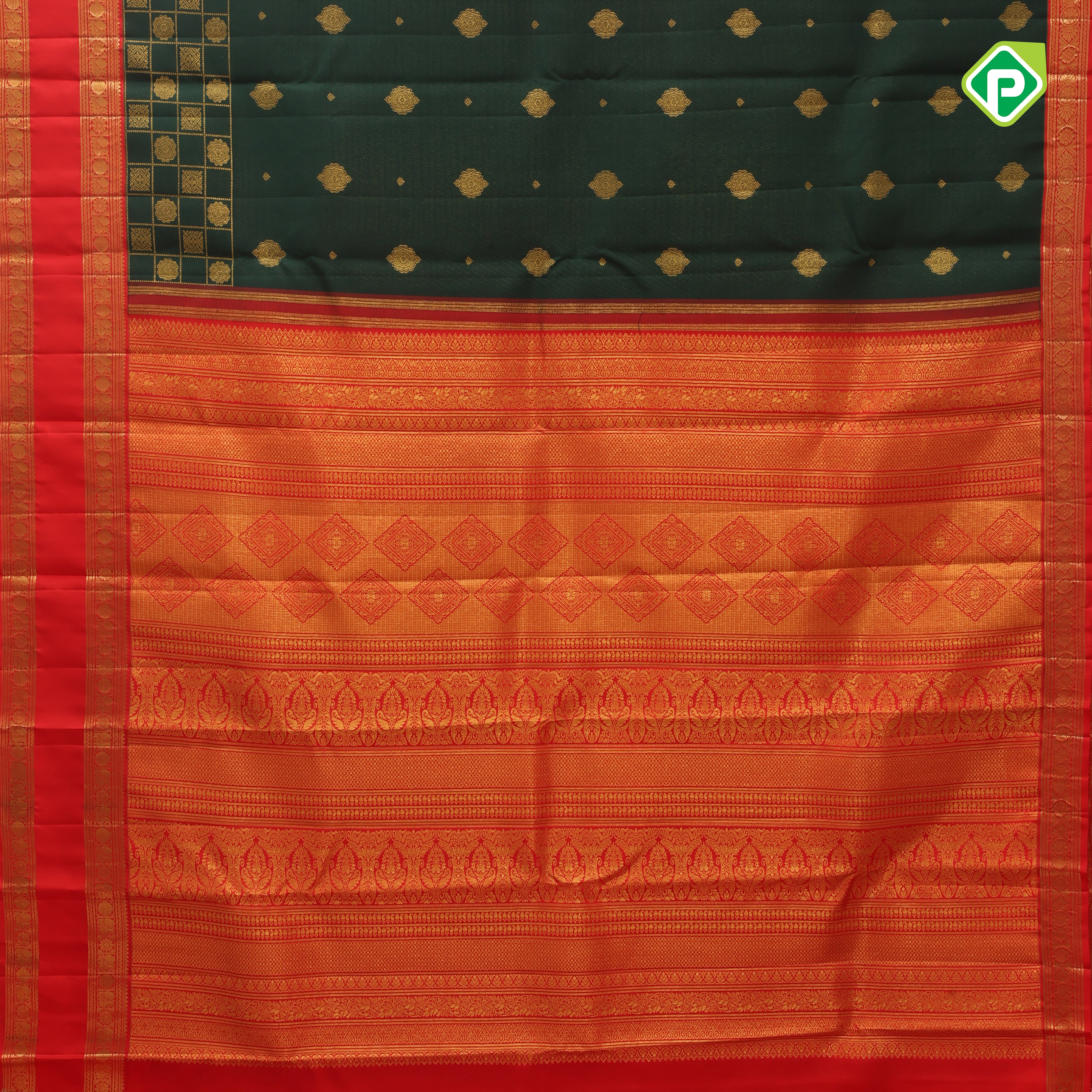 Deep green gold zari flower butta design contrast chilly red gold zari rettapet border grand bridal silk saree