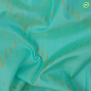 Sea green gold zari organized rain drop tissue weaved self gold zari edge border pythonic border pallu concept signature edition silk saree