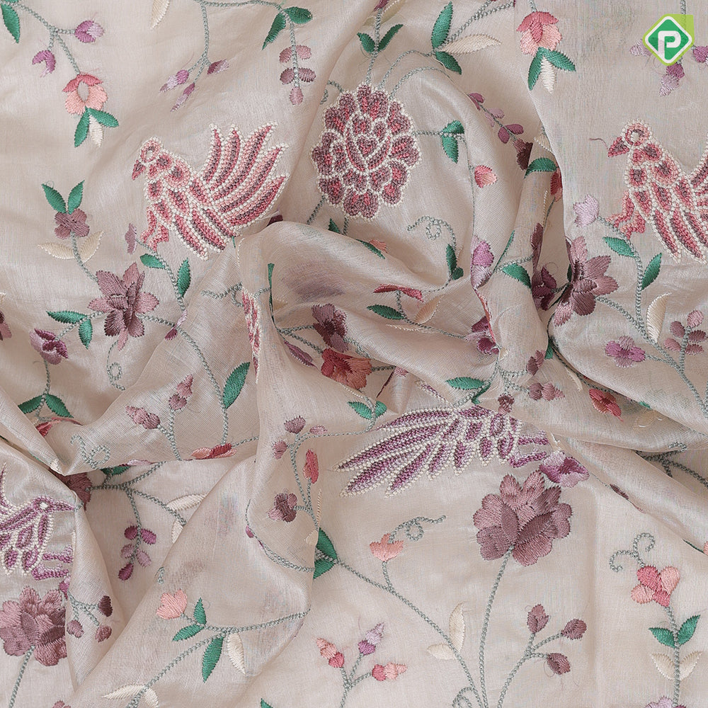cream base multi color floral embroidered design peach cream gold zari star diamond lines border kora silk saree
