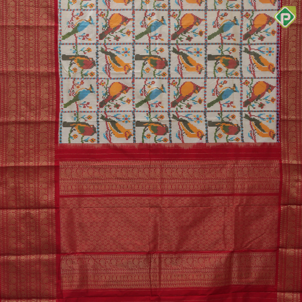 Sandal base multi color ikkat design red gold zari multi butta design koorvai border fusion silk saree