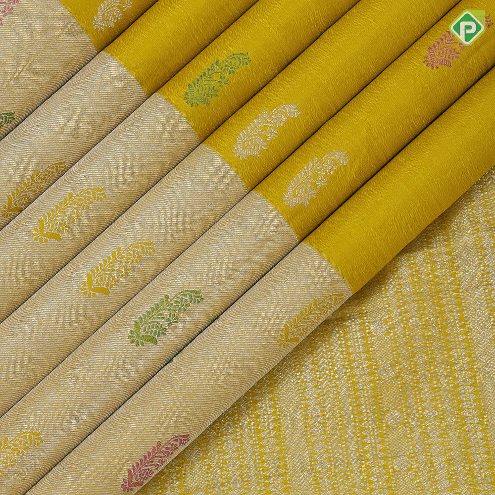 Lemon yellow silver zari fancy flower butta self silver zari and multi color butta border traditional silk saree