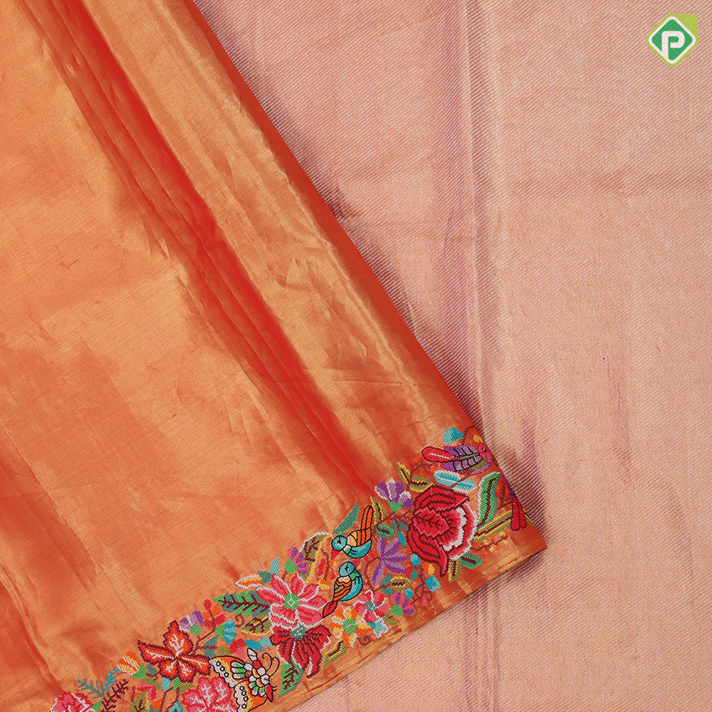 Goldish orange base silver zari diamond tissue weaved multi color thread embroidered border embroidery silk saree