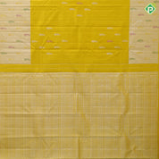 Lemon yellow silver zari fancy flower butta self silver zari and multi color butta border traditional silk saree