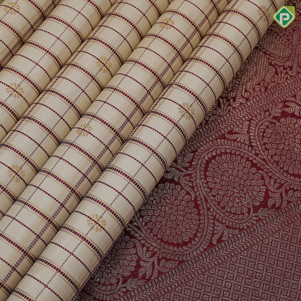 creamy sandal base maroon thread gold zari checks and butta maroon meena work border vintage traditional silk saree